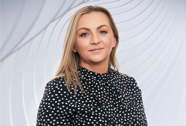 Headshot photo of Lana Kane, Director of Medforce Healthcare Recruitment with a white abstract background